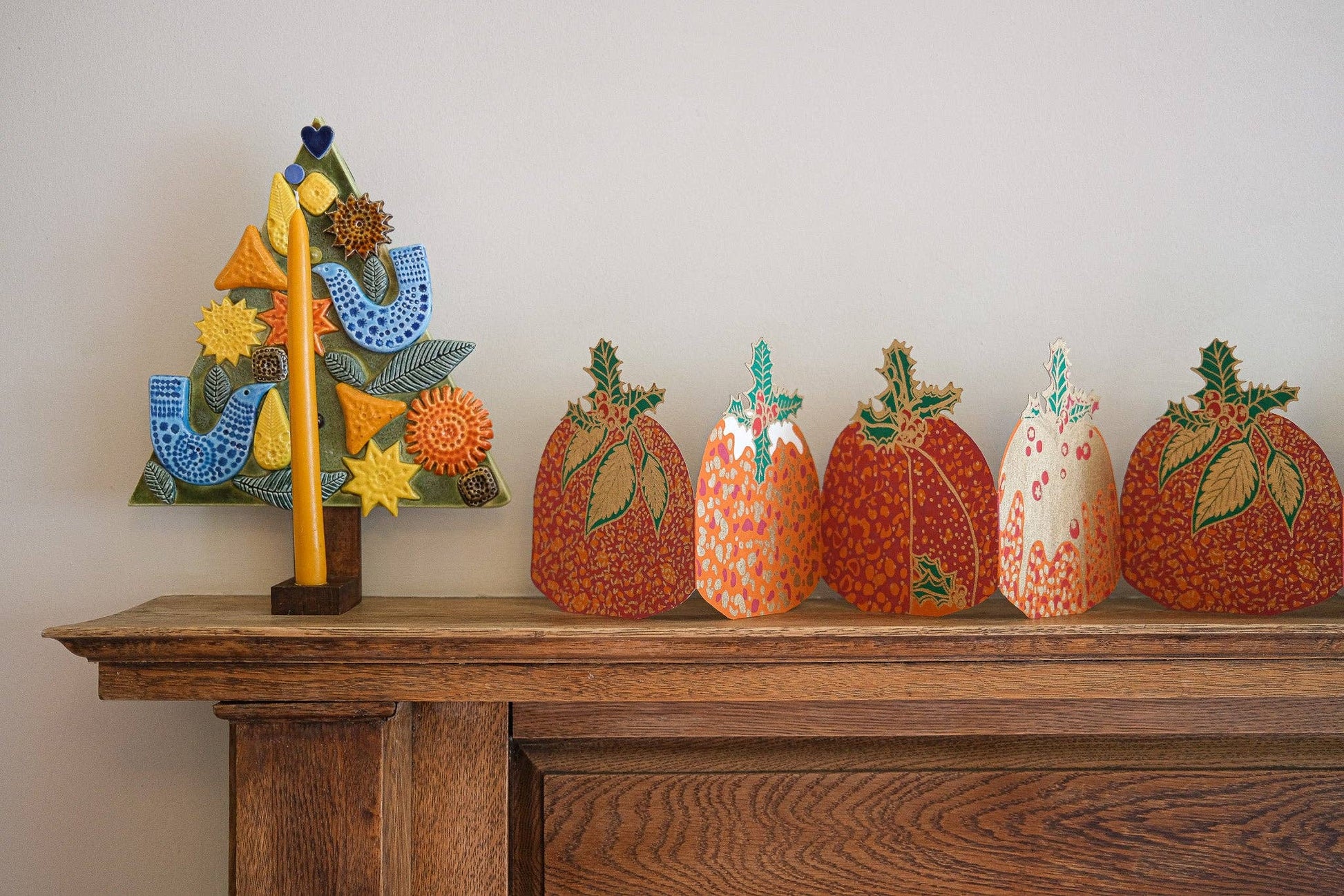 Hand-printed recycled paper Christmas Puddings Concertina Garland by East End Press, 3 metres long