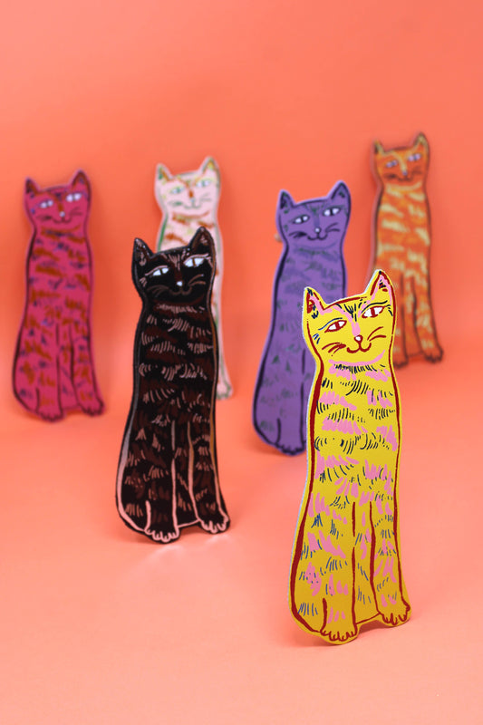 Close-up of Cat Tails leather bookmark, showing 'Tell Tales' detail