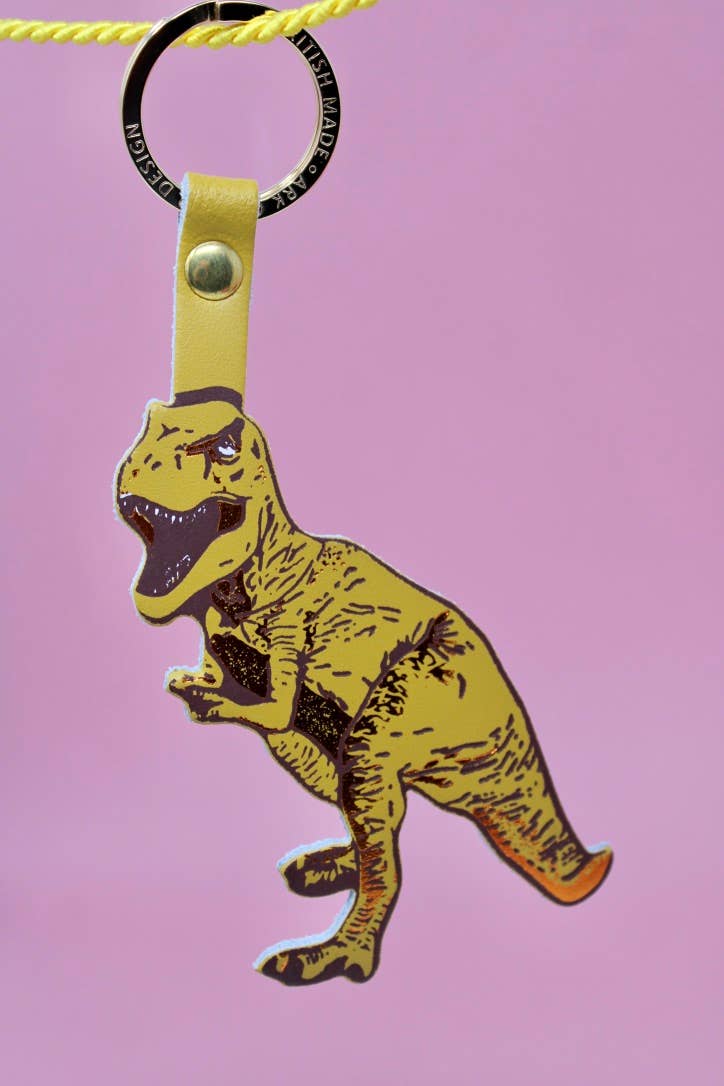 A pre-historic t-rex leather keychain for the fierce dinosaur in your life!