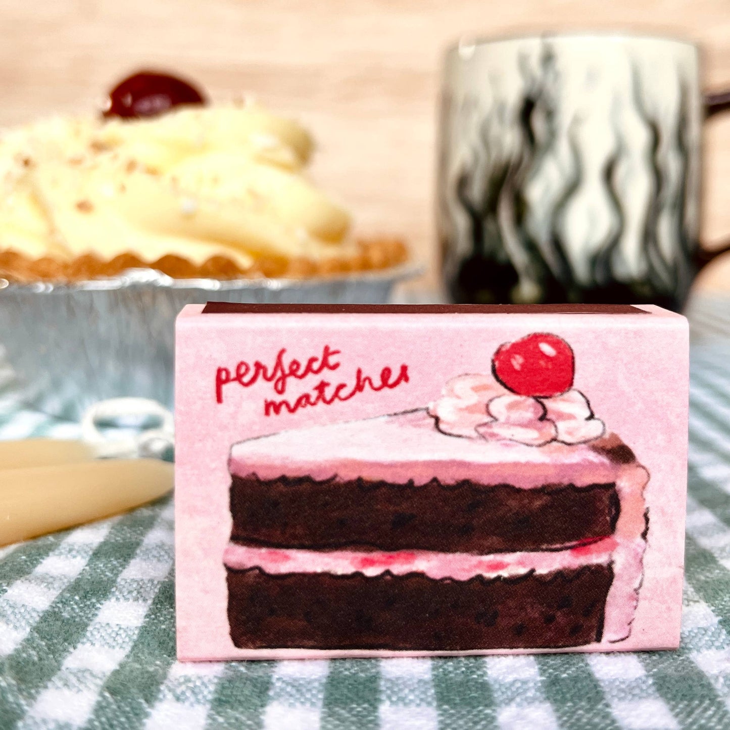 Perfect Cake Matches in a 100% recycled card box, ideal for lighting birthday candles