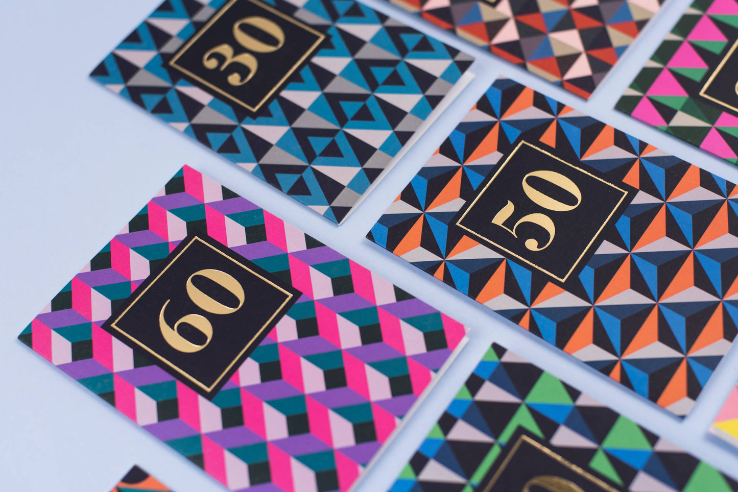 Close-up of 60th Birthday Card, showing gold foil detail and sustainably sourced card texture