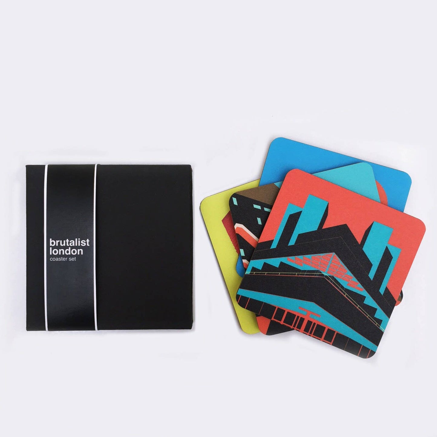 Brutalist London Coaster Set. Brutalist London Coaster Set. Set of 4 coasters featuring London Landmarks. Prints of Barbican, Brixton, Croydon and National Theatre. These coasters feature some of the most iconic Brutalist structures of London. One Croydon, the Barbican Tower, Southwyck House, Brixton and the National Theatre in South Bank.
Specs: The coasters measure 10 x 10cm, about 5mm thick. Cork backed hardboard, and matte laminated finish.
They come in a smart, minimal black match-box style packaging