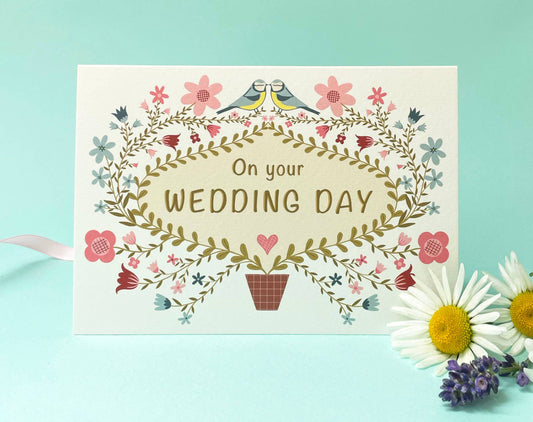 Close up of the textured sustainably sourced Tintoretto Gesso wedding card