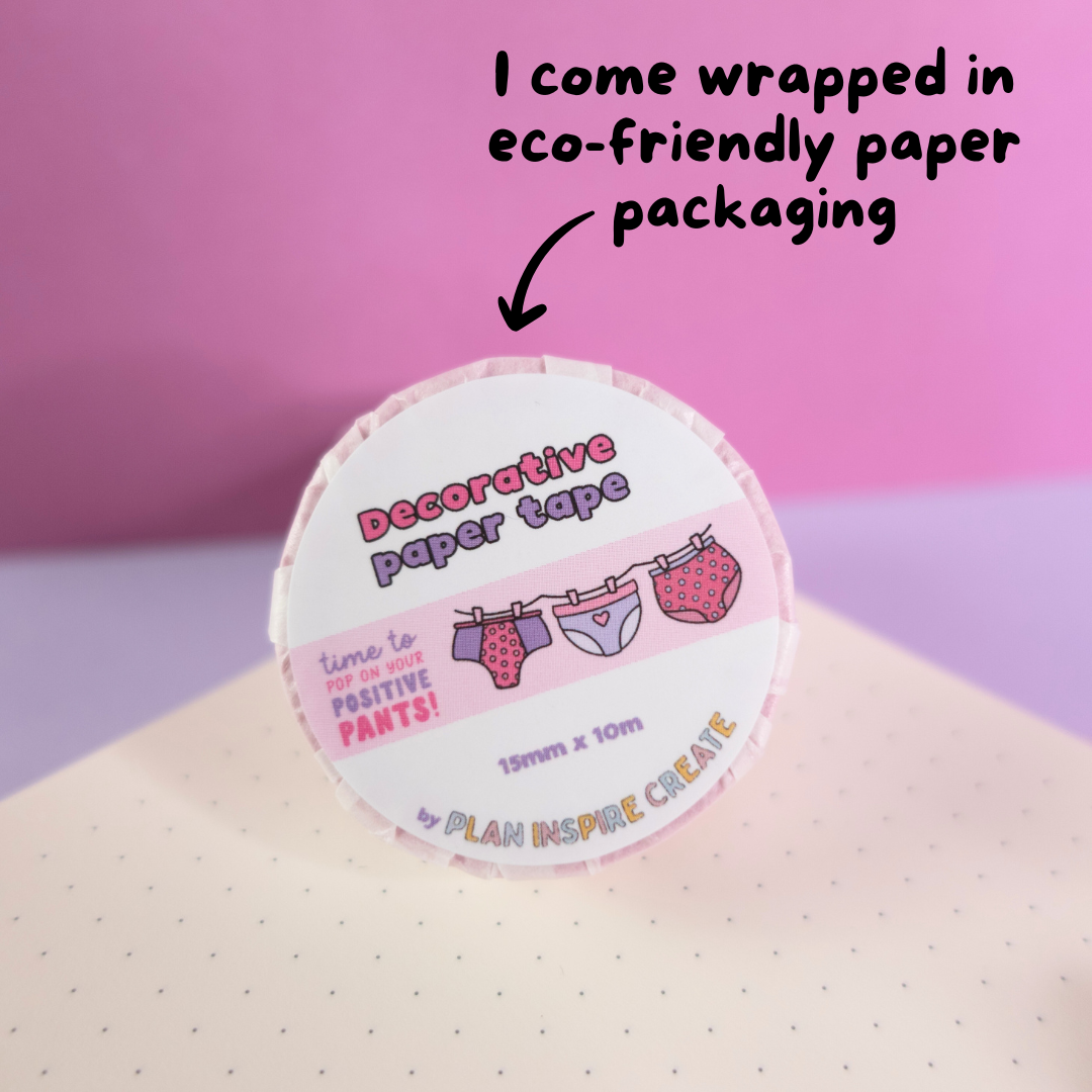 Pink and purple patterned pants washi tape with “pop on your positive pants” message and eco-friendly paper packaging—perfect for uplifting journaling and craft projects.