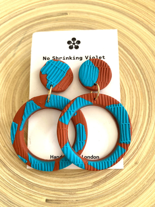 Handmade polymer clay Rockpool earrings, close-up of texture and colours