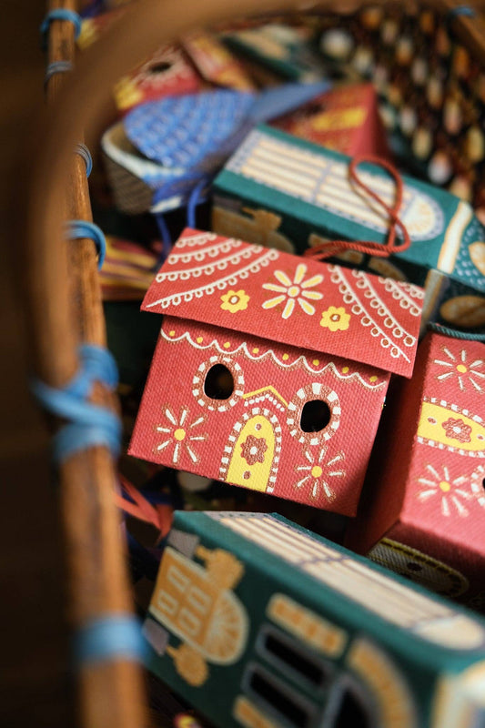 Gingerbread House Screen printed board hanging ornament, sustainably made from 100% recycled paper. 