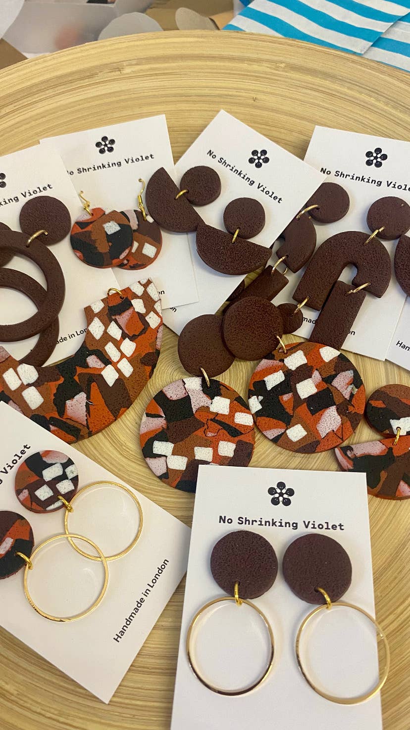 Ngurra Medium Earring modelled, showing scale and elegant drop, perfect for sensitive ears.