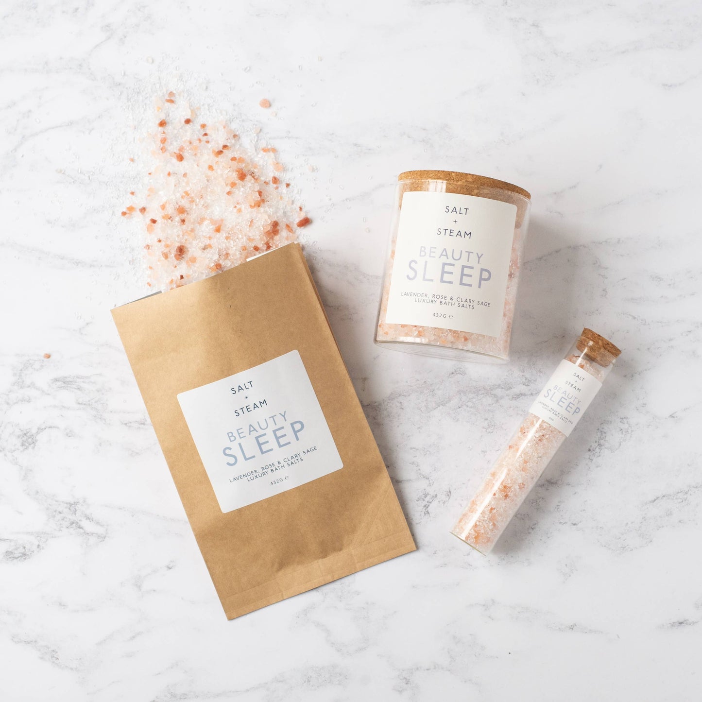 Beauty Sleep Lavender Rose and Clary Sage bath salts in glass jar.