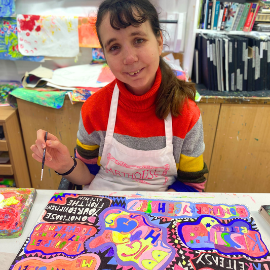 Close-up of 'Take It Easy' chocolate bar packaging, featuring Laura Tregellas' vibrant artwork.