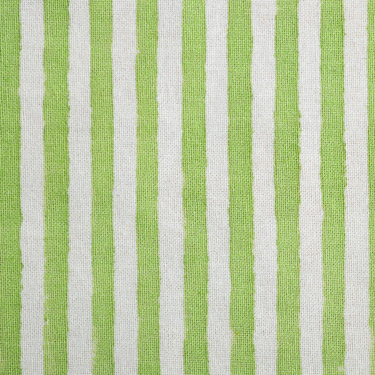 Close up of block printed green stripe pattern on cotton tea towel