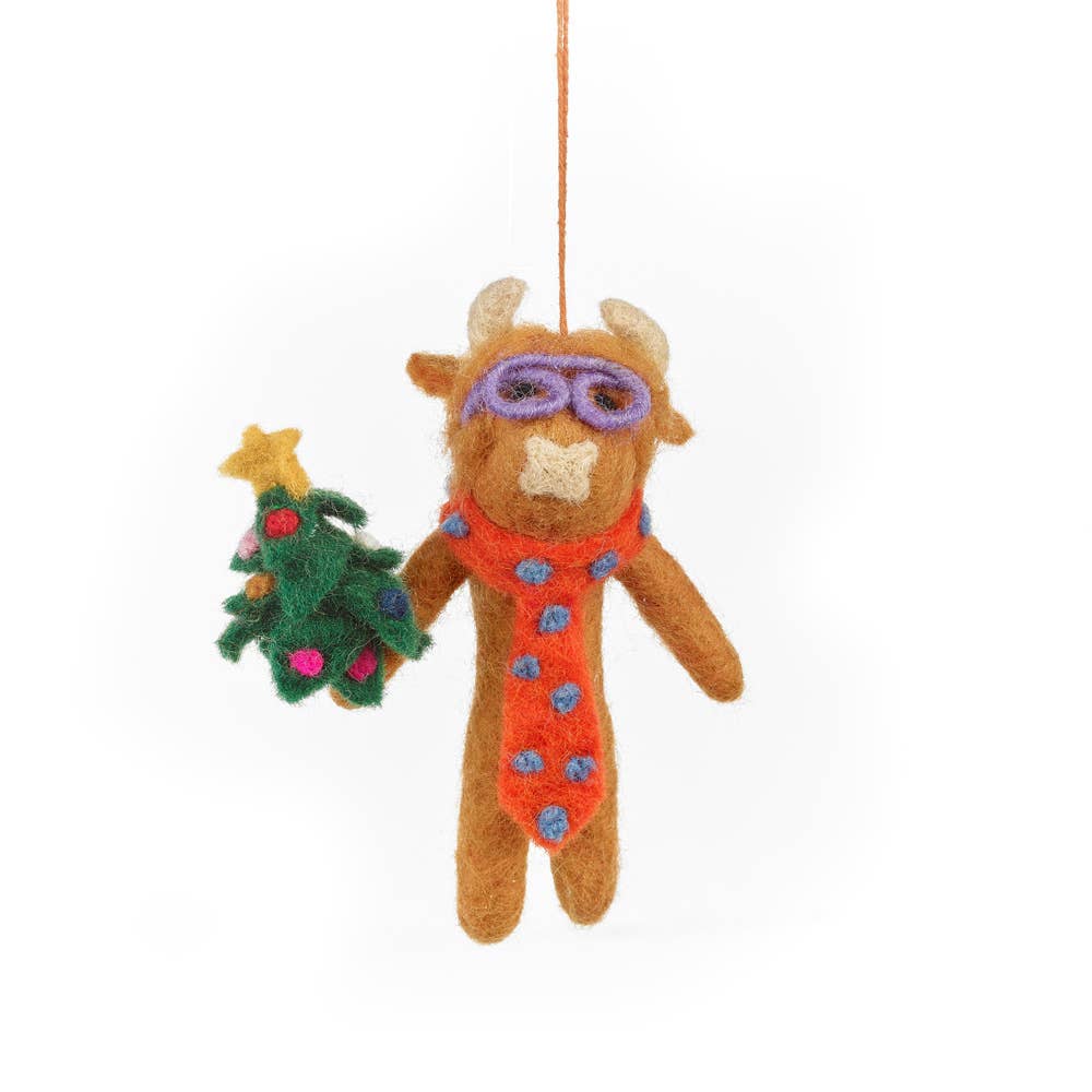 Handmade felt Christmas Cow hanging decoration "Curtis" by Felt So Good, sustainable wool with purple glasses, fair trade and eco-friendly