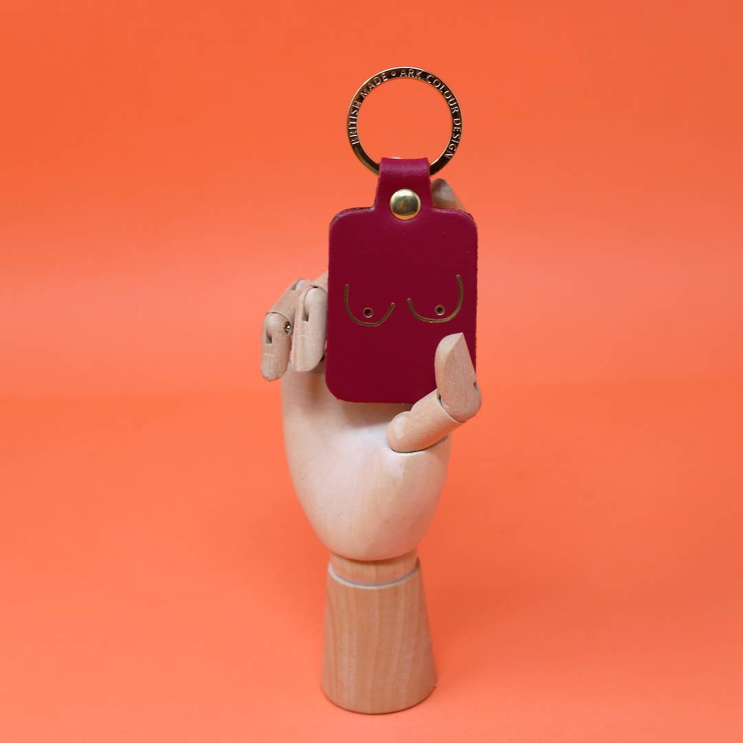 Boob keyring in genuine leather with gold-plated ring, made in Scotland, eco-friendly gift.