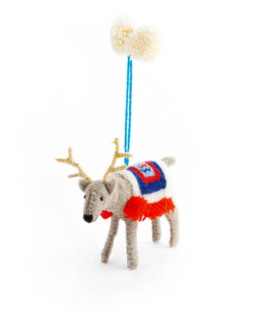 Handmade Randolph Reindeer Christmas decoration with detailed needle felting, embroidery, wool rug, and pom pom hanger for eco-friendly holiday decorating.