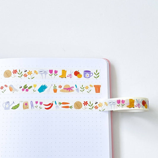 Close-up of Gardening Washi Tape showing detailed illustrations of gardening items on a cream background, perfect for crafts and journaling.