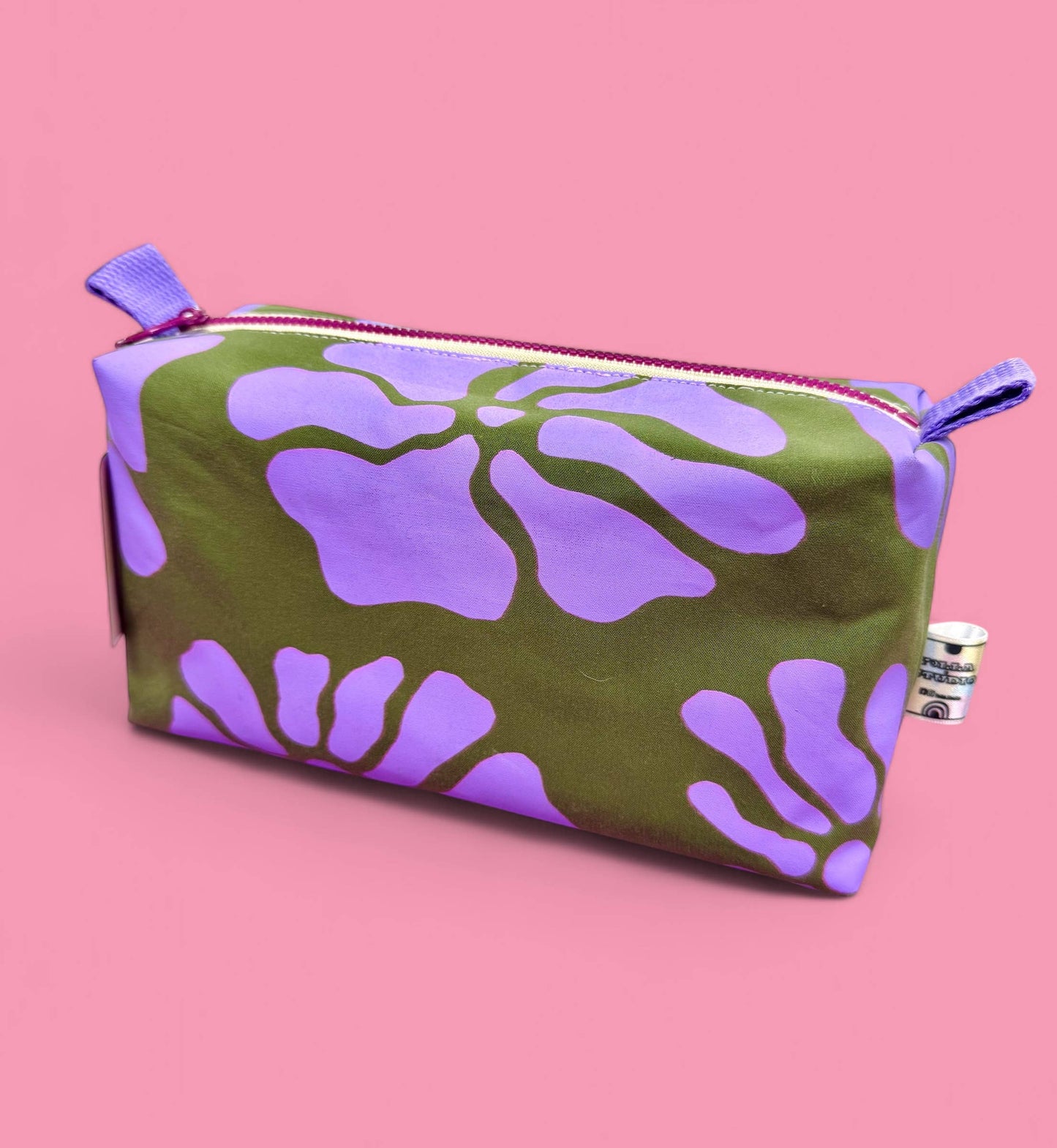 Lilac and green floral handprinted boxy pouch made from dry-wax cotton canvas, fully lined with contrasting fabric.