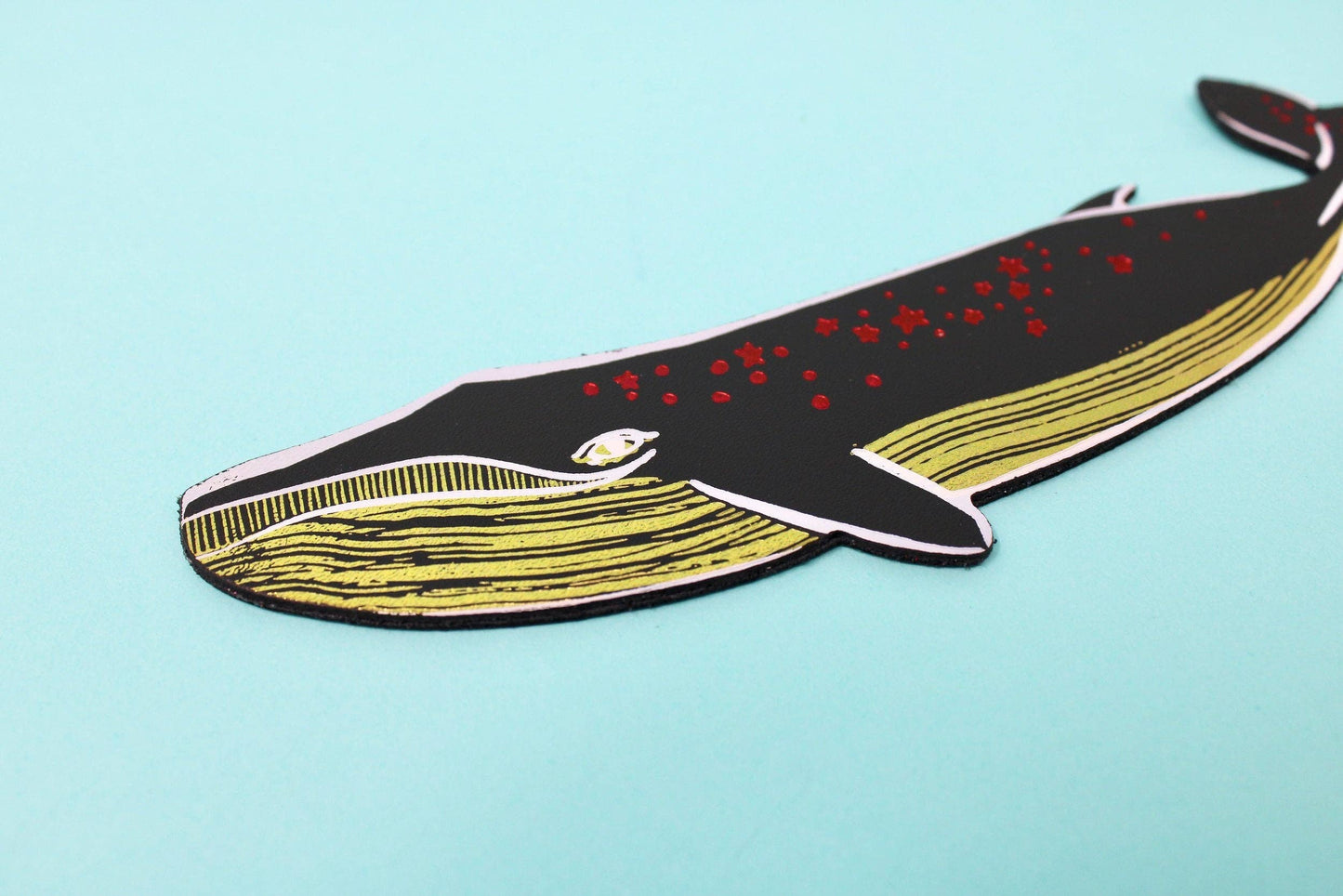 Whale bookmark close up of foil embossing