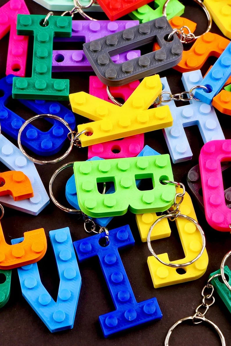 Variety of personalised initial brick keyrings in different colours