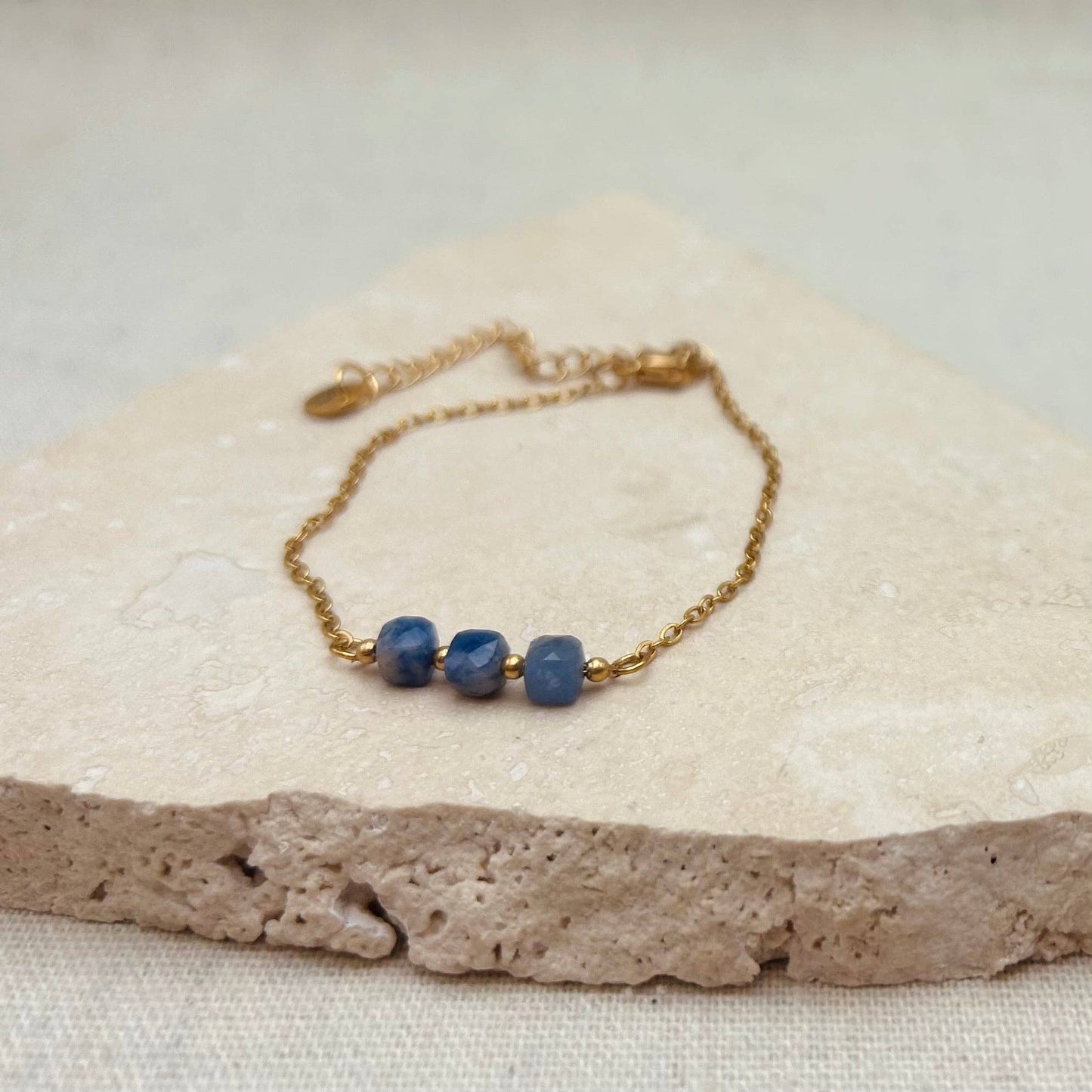 Little Nell lapis trio bead bracelet, gold-plated, waterproof, adjustable chain, and celestial blue lapis lazuli beads