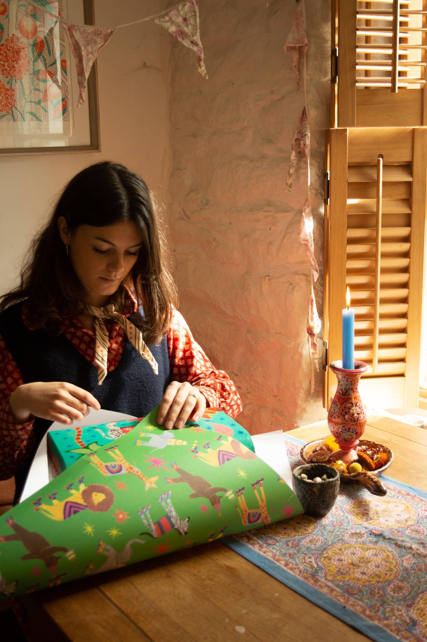 Rolled sheet of Animal Roller Disco gift wrap, showcasing vibrant design