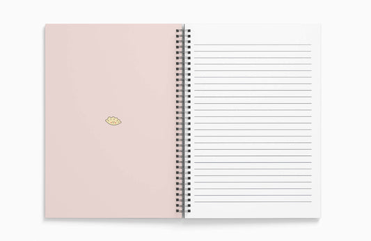 Detailed view of the gyoza design on a textured notebook cover