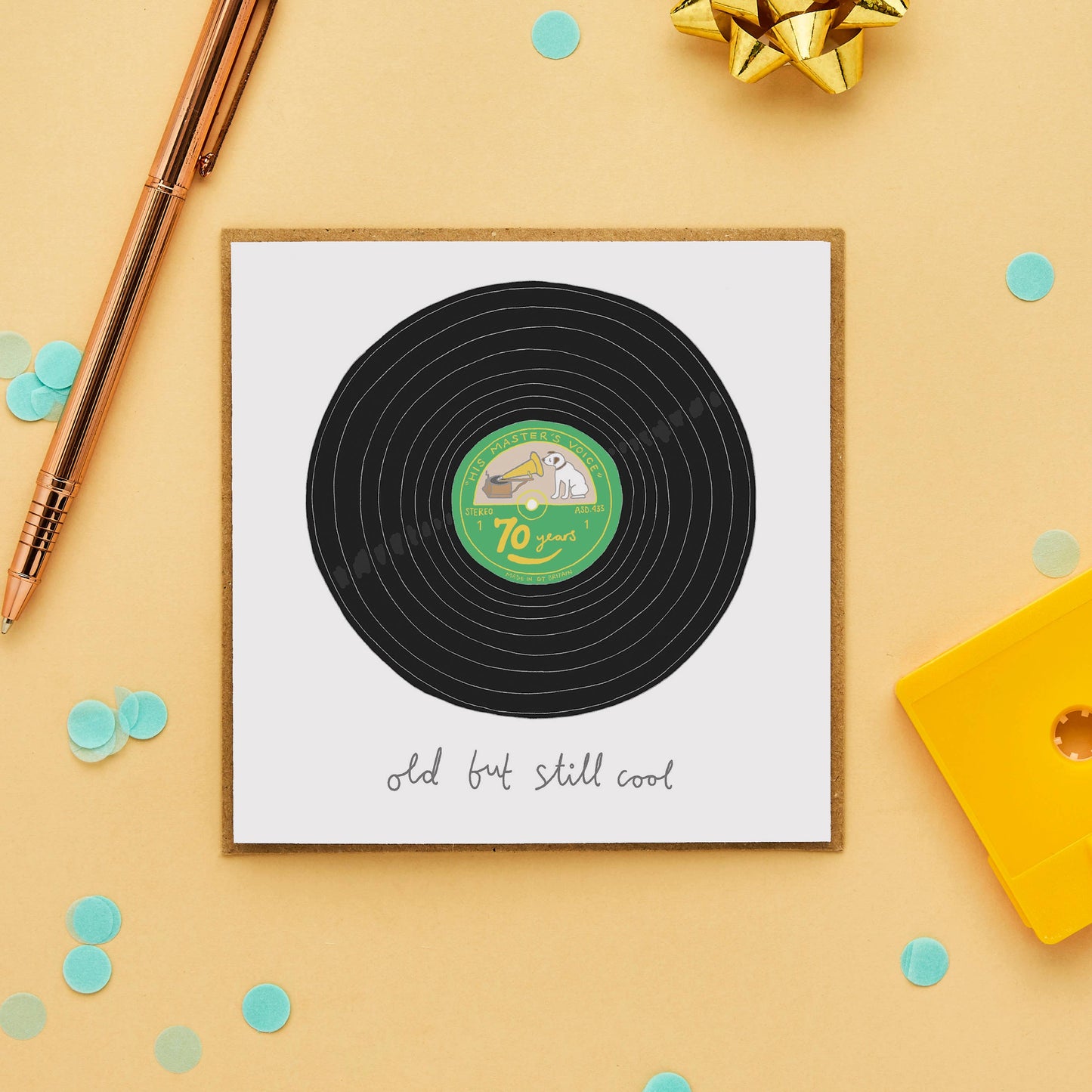 Featuring a hand-drawn illustration of a vinyl record, this witty card celebrates turning 70 with style and humour. The message on the front, written in a playful, hand-drawn font, reads "70 years, Old but Still Cool," making it the perfect choice for music lovers or anyone with a timeless sense of cool.