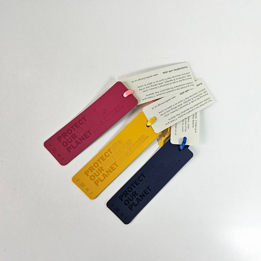 Close up of debossed detail on raspberry pink leather bookmark