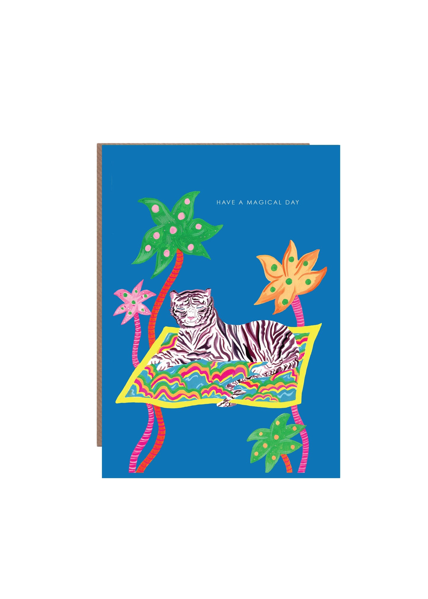 Hand-illustrated magical tiger on a magic carpet among palm trees, 5x7” birthday card, recycled kraft envelope, UK made, sustainable and mystical design.
