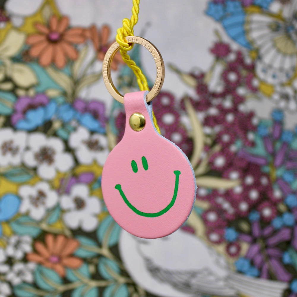 Feeling Lush Smiley Leather Key Ring, reverse view with 'Feeling Lush' text