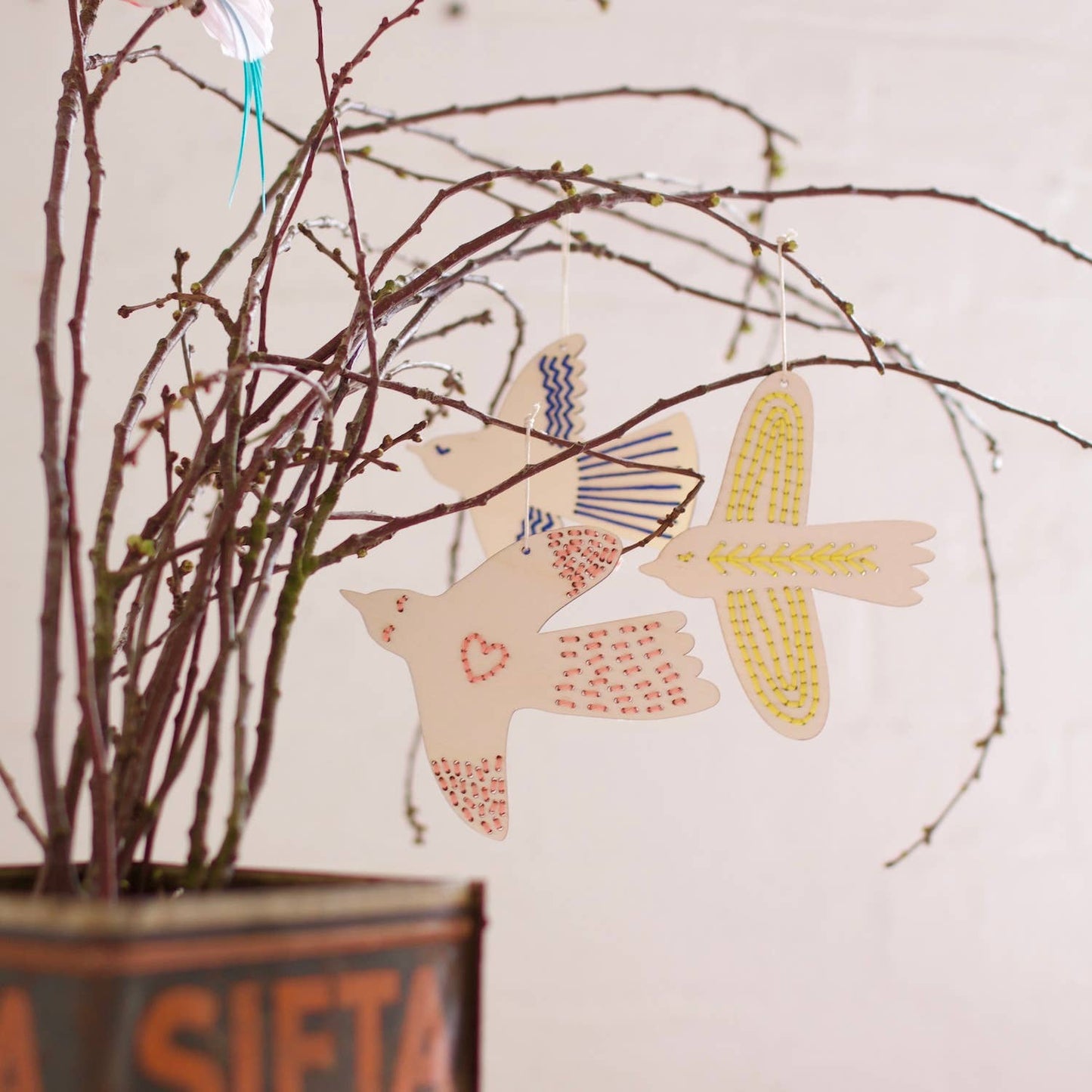 Group of three finished embroidered birds