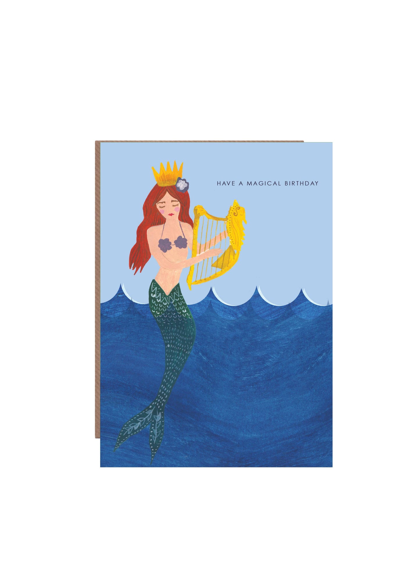 Hand-illustrated “Magical Mermaid” birthday card featuring a joyous colourful mermaid, 5x7", recycled kraft envelope, UK made, sustainable design.