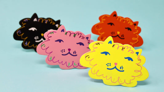 Set of four Fat Cat genuine leather coasters embossed with playful fat cat designs, handmade in Britain by Ark Colour Design
