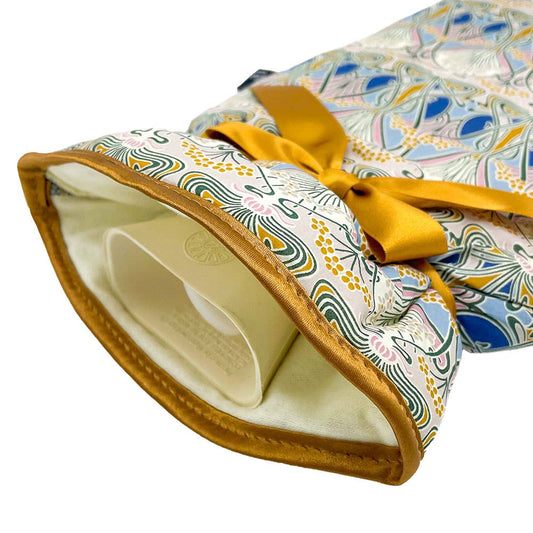 Close-up of Liberty Ianthe Nouveau pattern on hot water bottle cover, showcasing Art Nouveau design.
