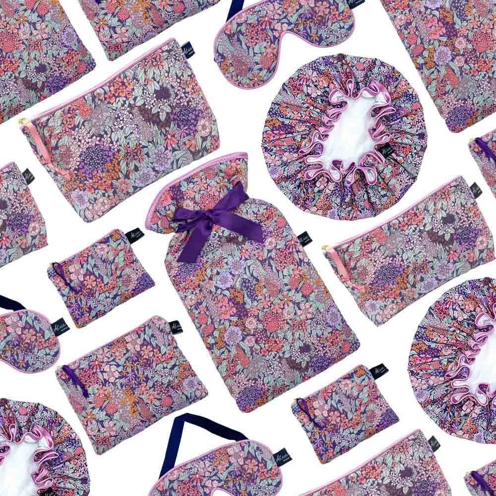 Collection of sustainable beauty accessories, including the Liberty Ciara Lavender face cloth, showcasing matching designs.