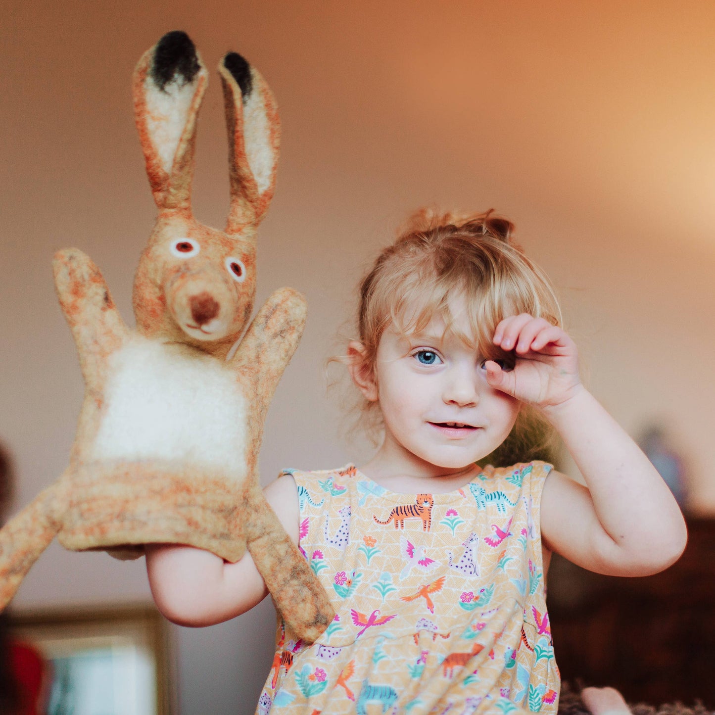 Close-up of Hartley Hare hand puppet's needle-felted face and long ears