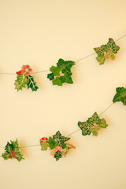 Hand screen printed Holly and Ivy Sewn Garland by East End Press on recycled paper with cotton thread