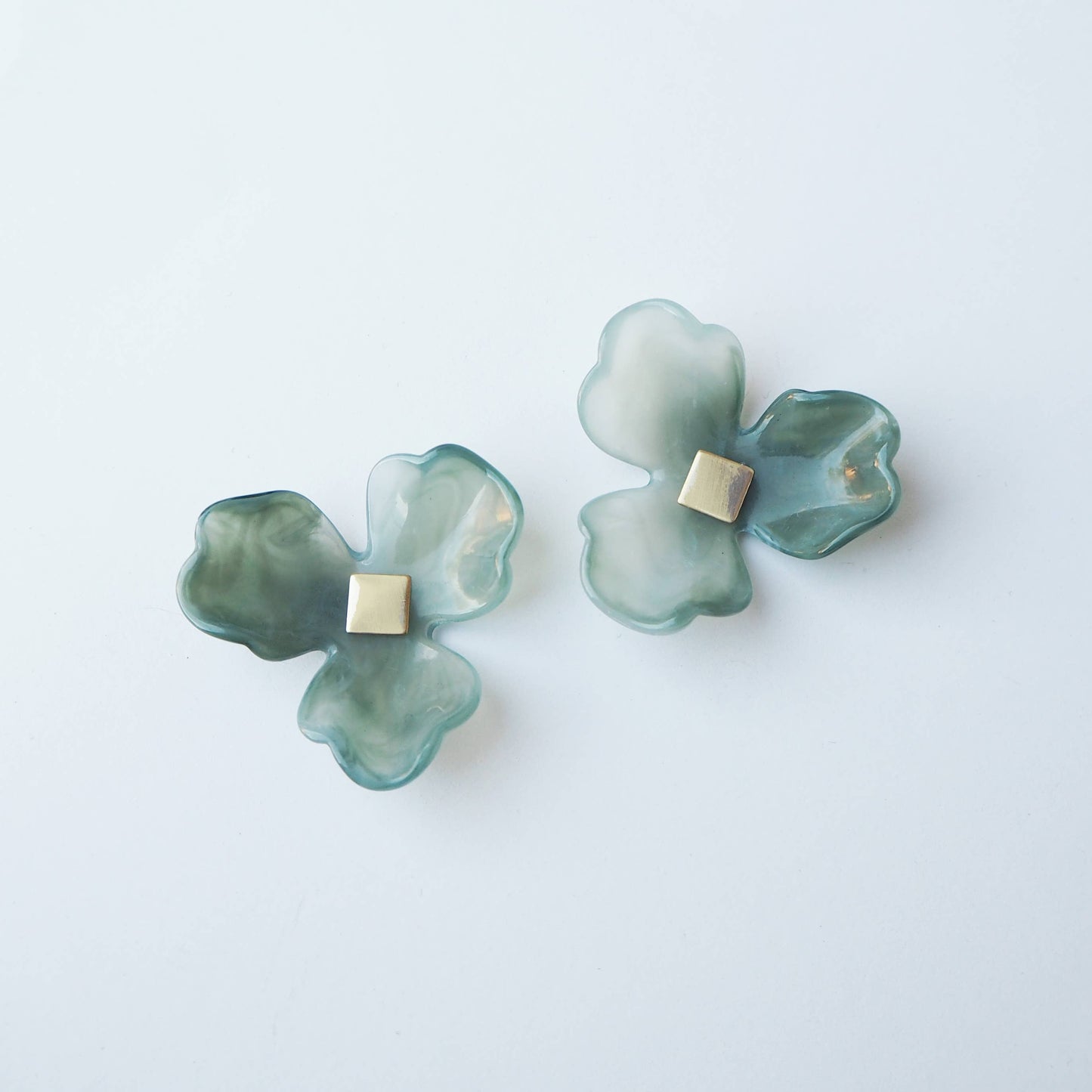 Eco-friendly biodegradable gift packaging and green flower stud earrings