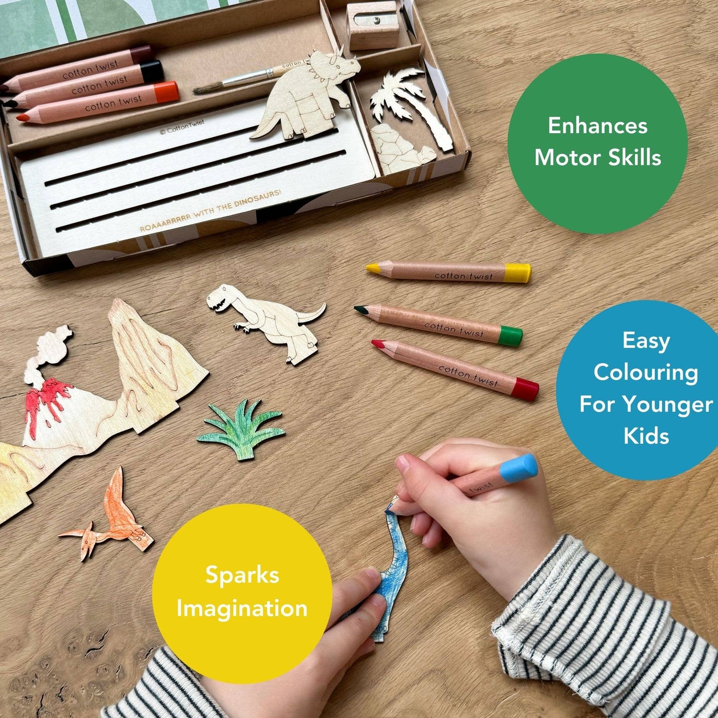 Various wooden dinosaur figures (T-Rex, triceratops, brachiosaurus) standing on the wooden display base.