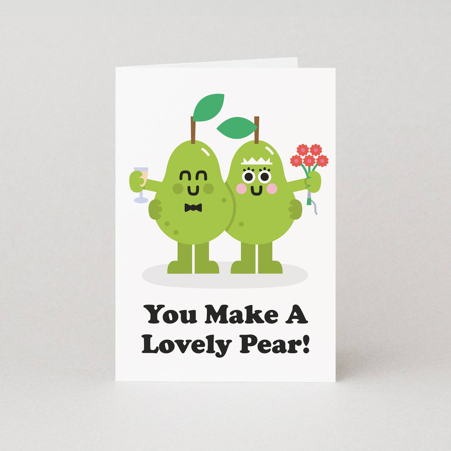 Illustrated wedding card with two pears as bride and groom, “You make a lovely pear” pun, A6 size, eco-friendly.