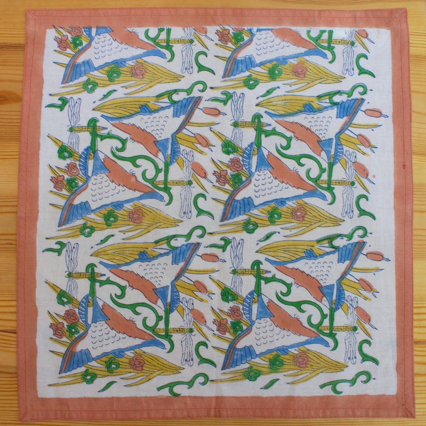 Hand wood block printed organic cotton napkins made in Jaipur, India. Add a touch of joy to your dining table with our beautiful set of four organic cotton napkins. Featuring AARVEN's signature 'Kingfisher' print. Block printed with different colourful borders sown in coral onto a white organic cotton background.