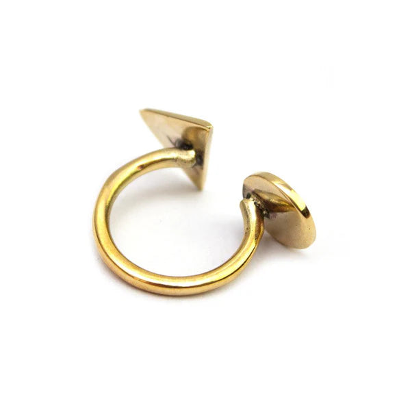 Chunky open recycled brass ring with swirl texture and warm gold-tone finish, handmade in Kenya by Anton & Benta