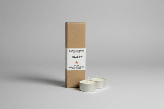 Meadow Soy Wax Tealights 8 pack, handmade in Cornwall. Recyclable aluminium, fresh citrus and white floral fragrance. Sustainable & vegan candles.