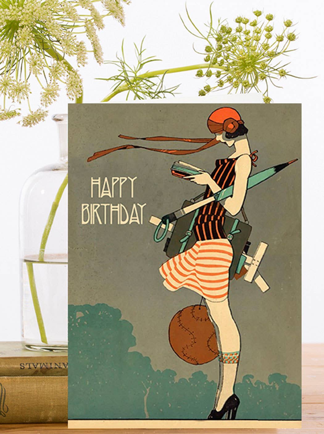 Vintage 1920s Sportswoman Birthday Card with a classic retro design, printed on sustainably sourced paper, shown with an ivory envelope