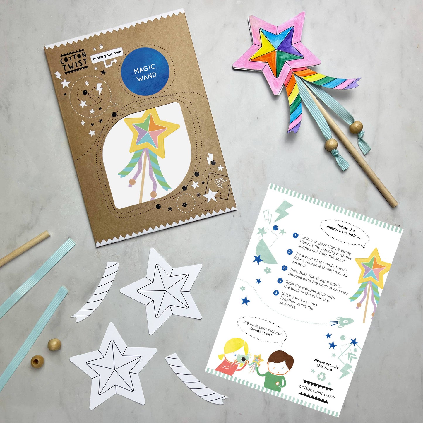Child creating a DIY magic wand craft kit, eco-friendly toy