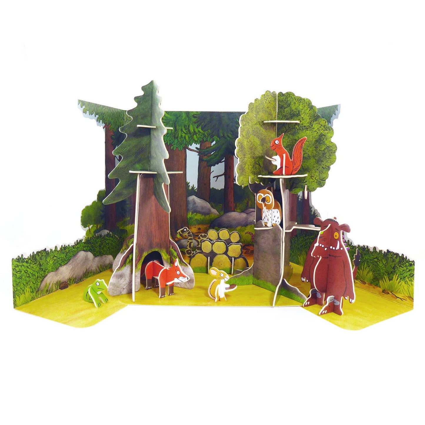 The Gruffalo pop-out playset pieces laid out with characters, trees, and scenery. Sustainable wooden toy for kids.