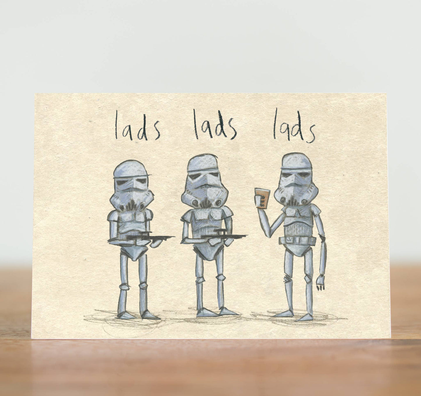 A great card for the mate who is a real trooper. The friend you can always rely on to be there for a lad's night out will appreciate this card. It’s perfect for birthdays or any other pint-worthy occasion!
We can’t use hyperdrive to get to another planet, so let’s look after this one. This laddish card is made from recycled paper and wrapped in fully biodegradable film.
Illustrated card, featuring three Stormtroopers on a lad’s night out