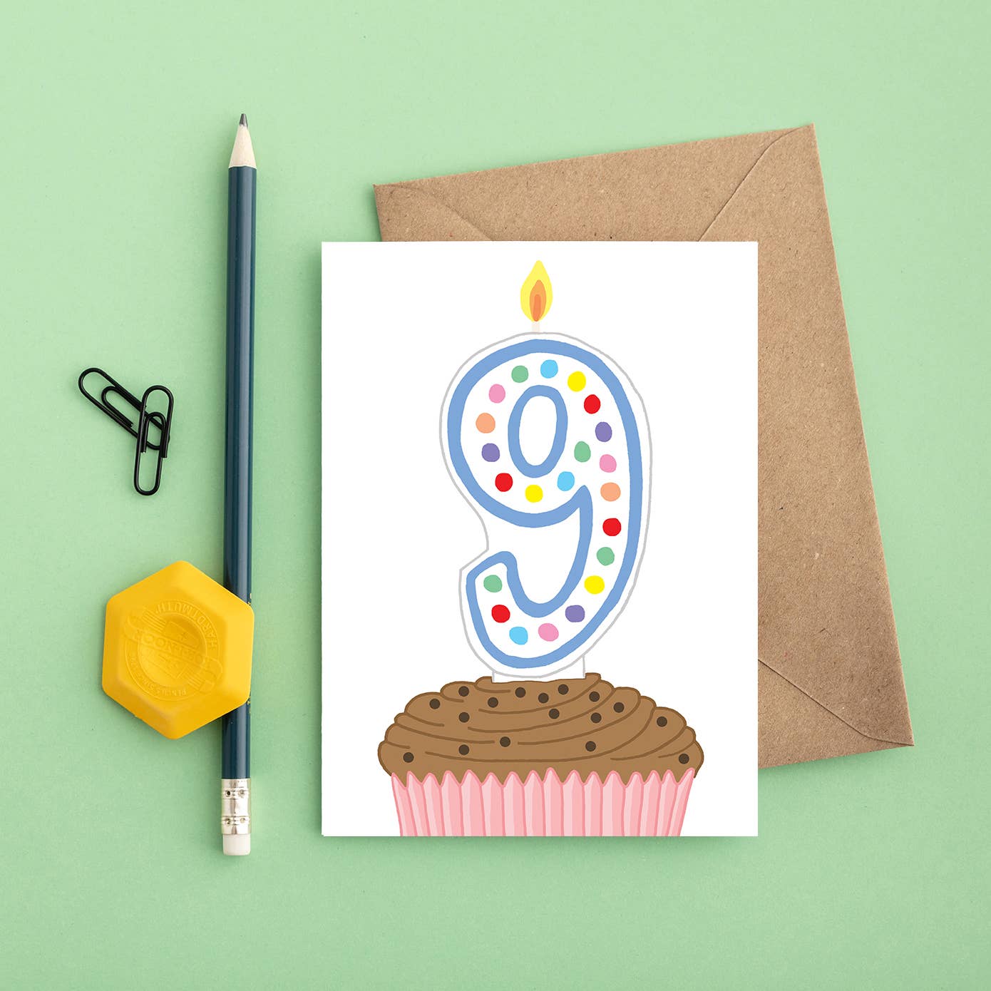 Brightly coloured cupcake 9th birthday card with a number nine candle and a Kraft envelope, sustainably sourced