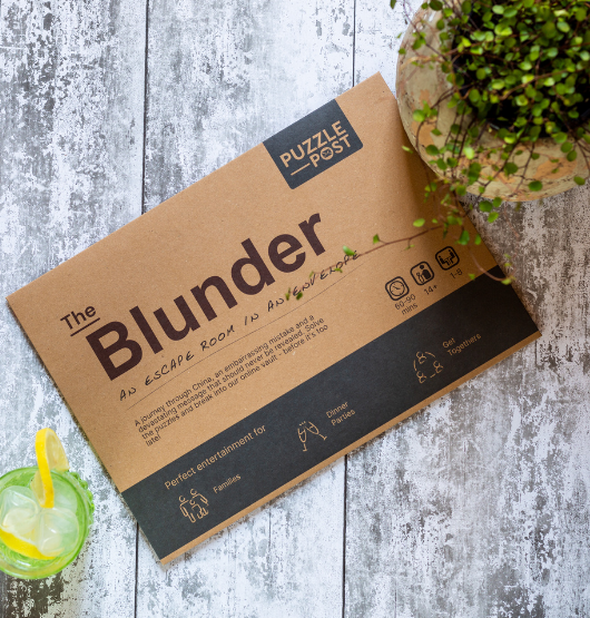Escape Room in An Envelope The Blunder puzzle game box, featuring China-themed adventure, eco-friendly packaging, and multiplayer fun for ages 14+. Sustainable game night.