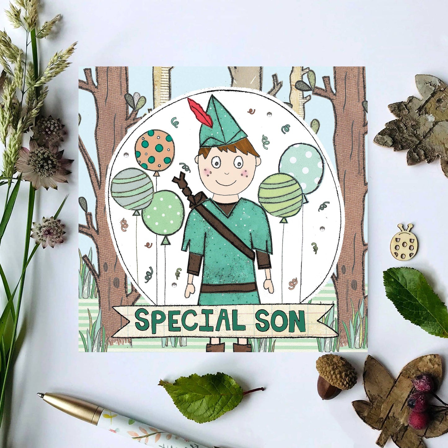 Hand-illustrated 'Special Son' greeting card by Flossy with paper flowers and gems