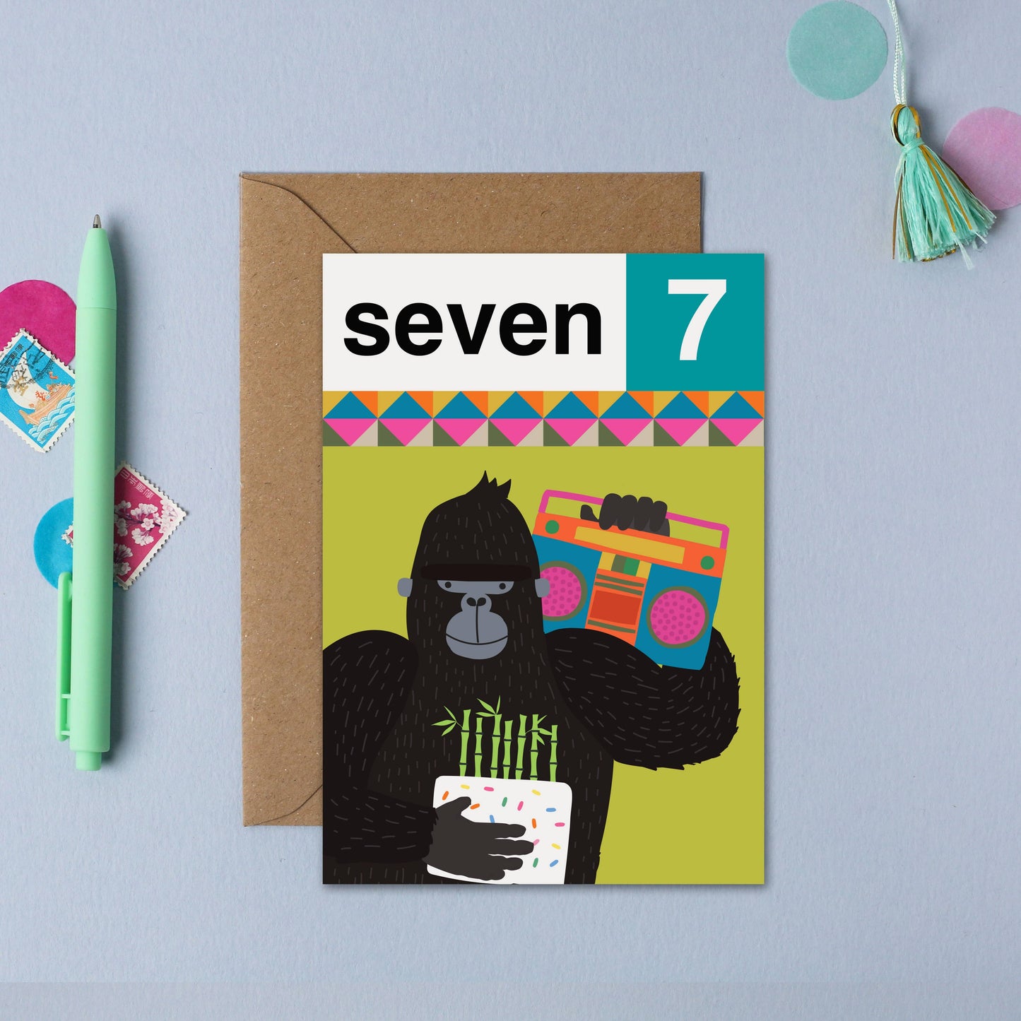 Eco-friendly 7th birthday card featuring a cool gorilla with a birthday cake and boombox, UK made