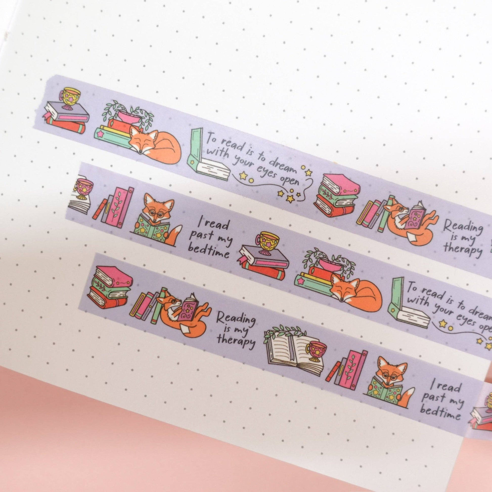 Cosy washi tape with Maple the Fox and bookish illustrations, fun reading quotes, eco-friendly paper packaging—great for planners, crafts, and gifts.